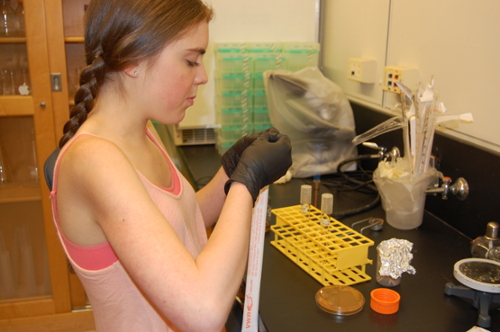female student in a science lab